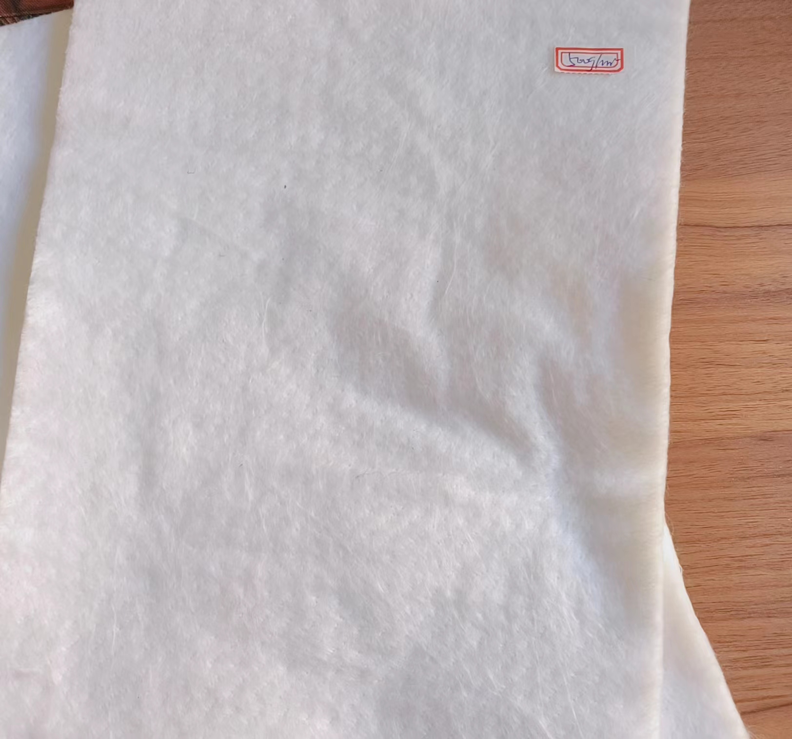 沥青路面铺设长丝土工布有什么作用